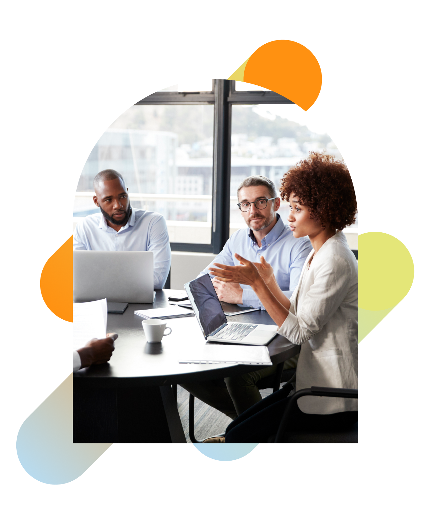 Group of professionals discussing strategy in a conference room.