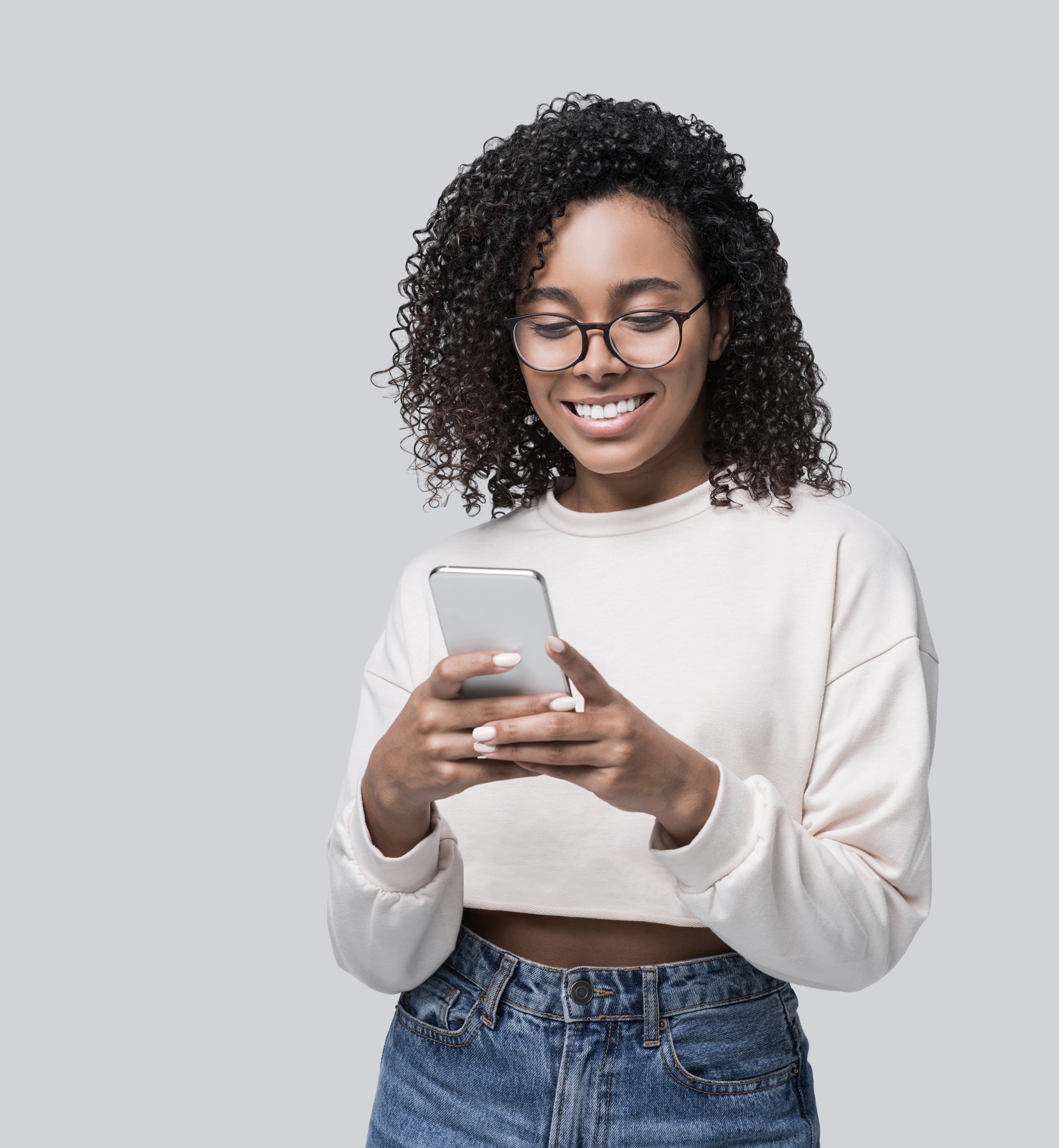 Woman texting and a view of a text messaging interface on a smartphone.