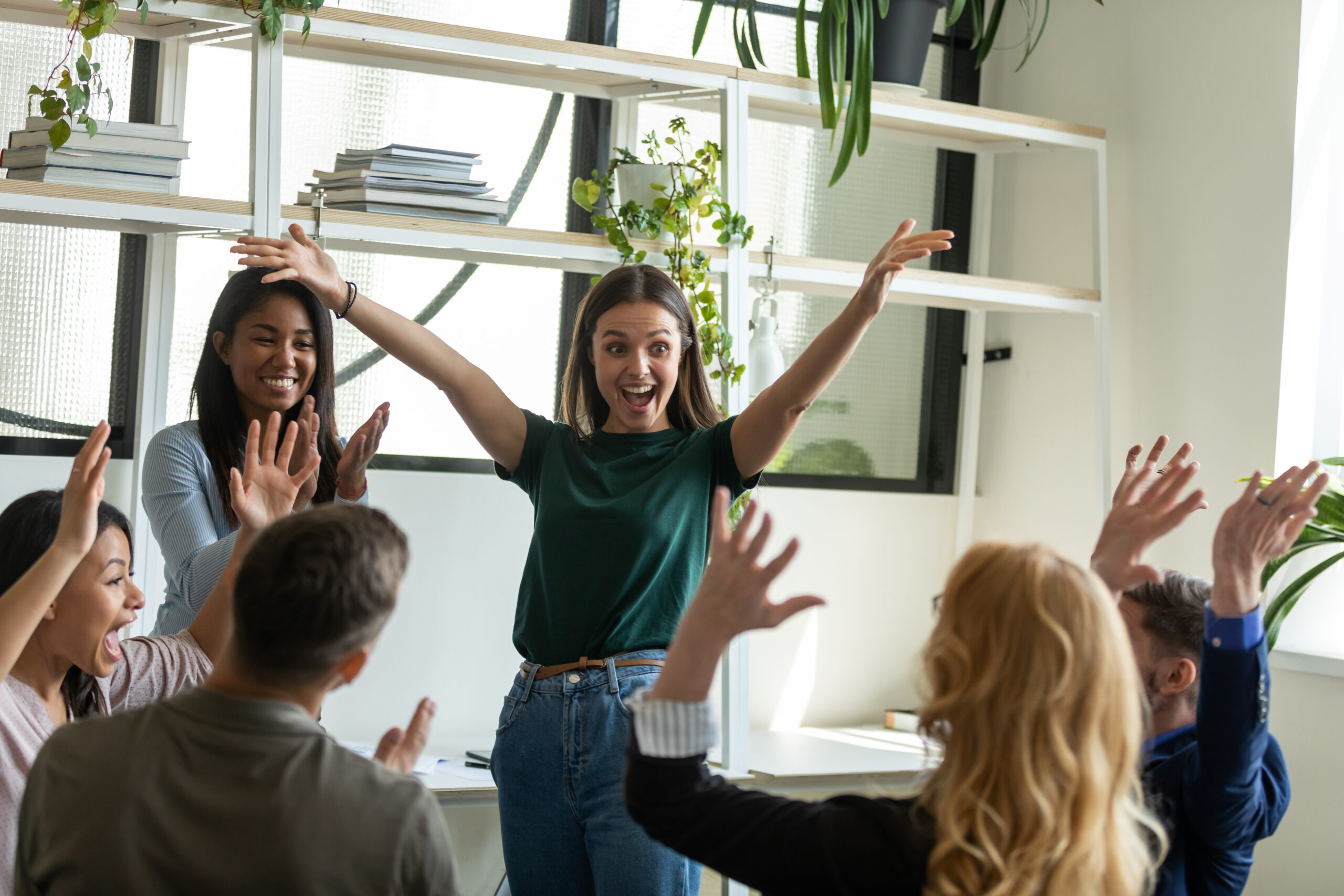 Happy, animated woman conducting training session.